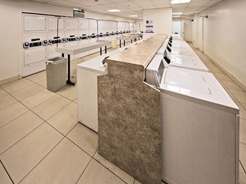 Coinless laundry centers